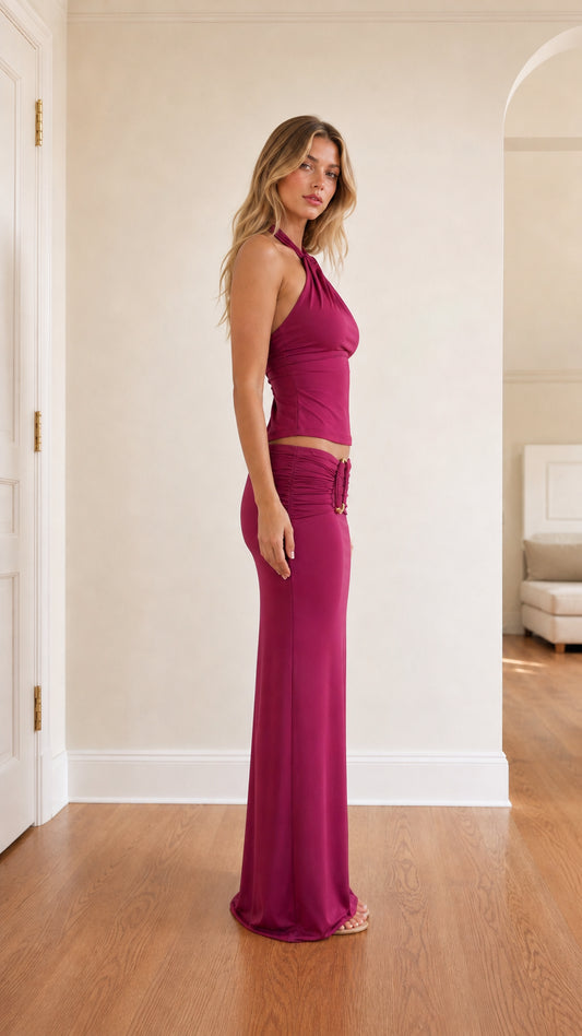Side profile of model in fuchsia two-piece set