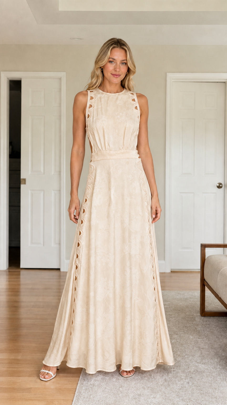 Front view of woman wearing champagne cutout maxi dress