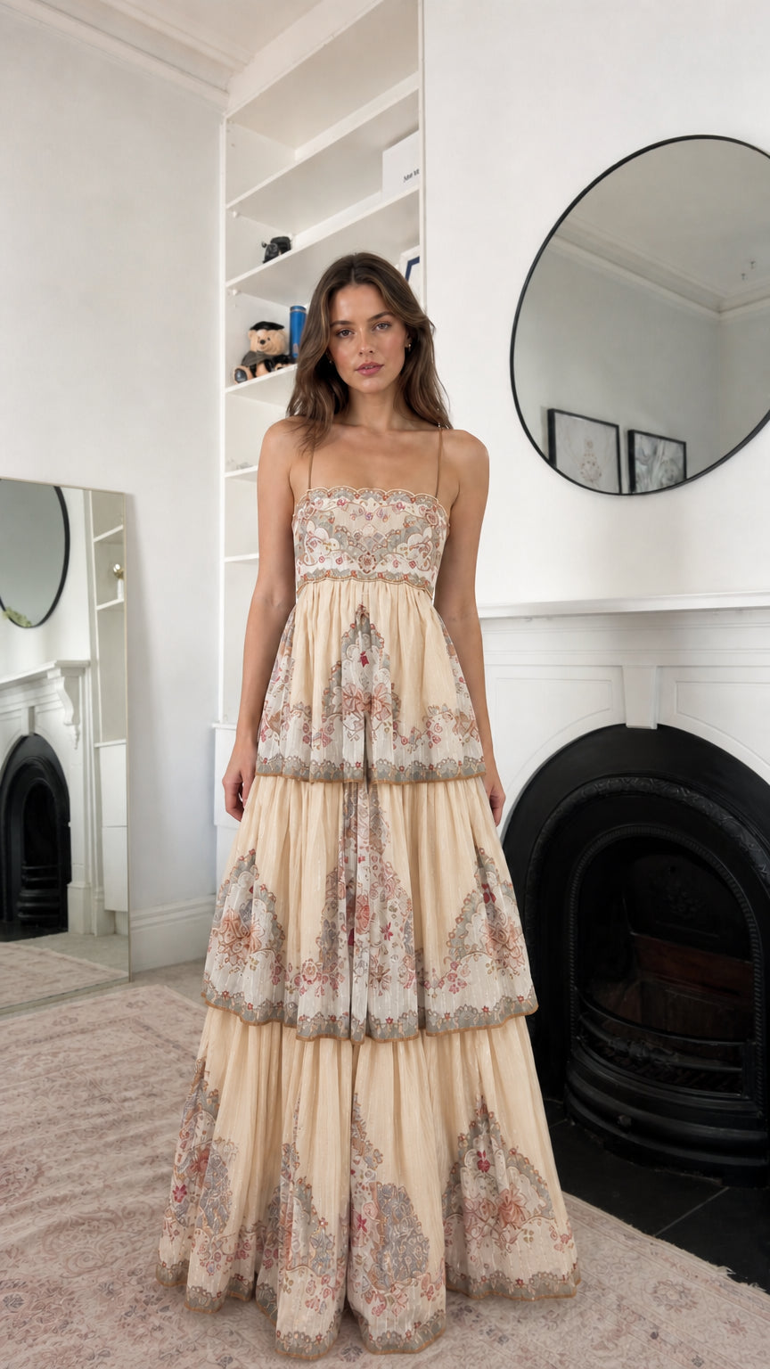 Cream floral tiered maxi dress shown from the front