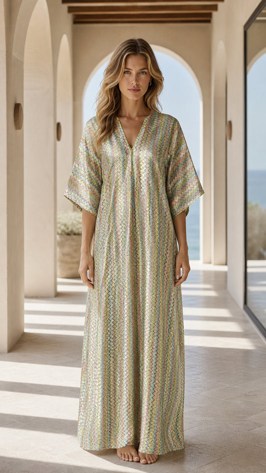 Front view of woman wearing multi sage chevron knit maxi kaftan dress