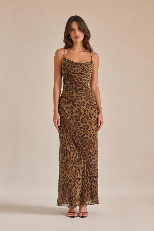 Front view of woman wearing brown leopard print maxi slip dress