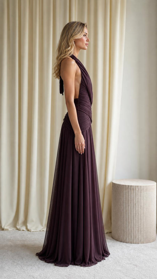 Side profile view of plum evening gown