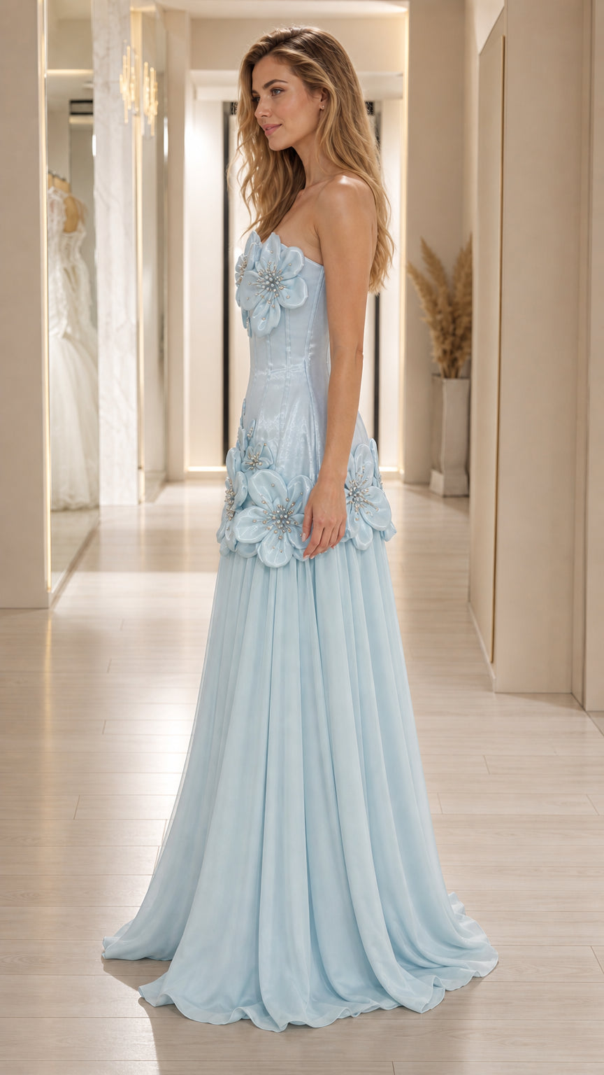 Side profile view of light blue floral gown