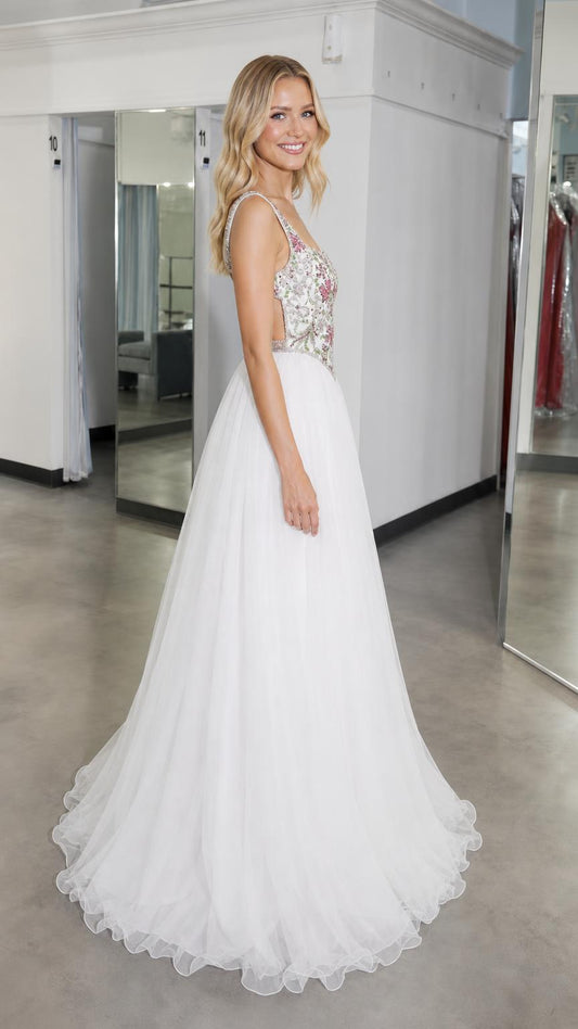 Side profile of white embroidered bodice tulle ball gown