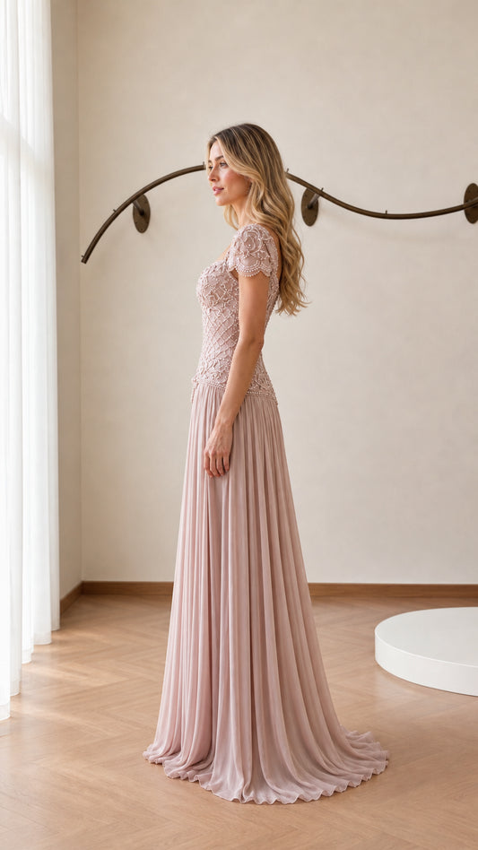 Side profile view of blush pink evening gown
