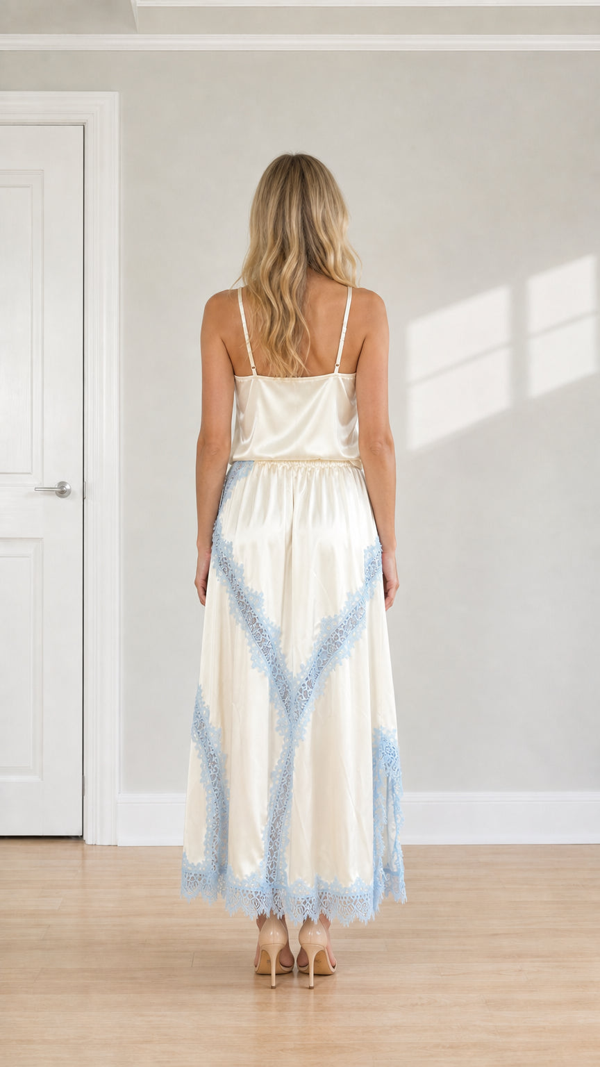 Back view of champagne satin cami and maxi skirt set