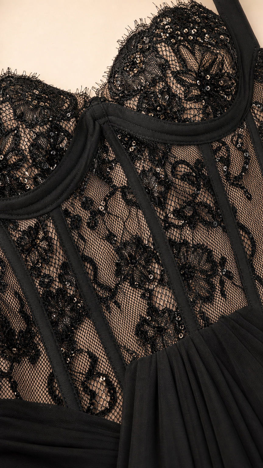 Close-up detail of black lace corset bodice and boning