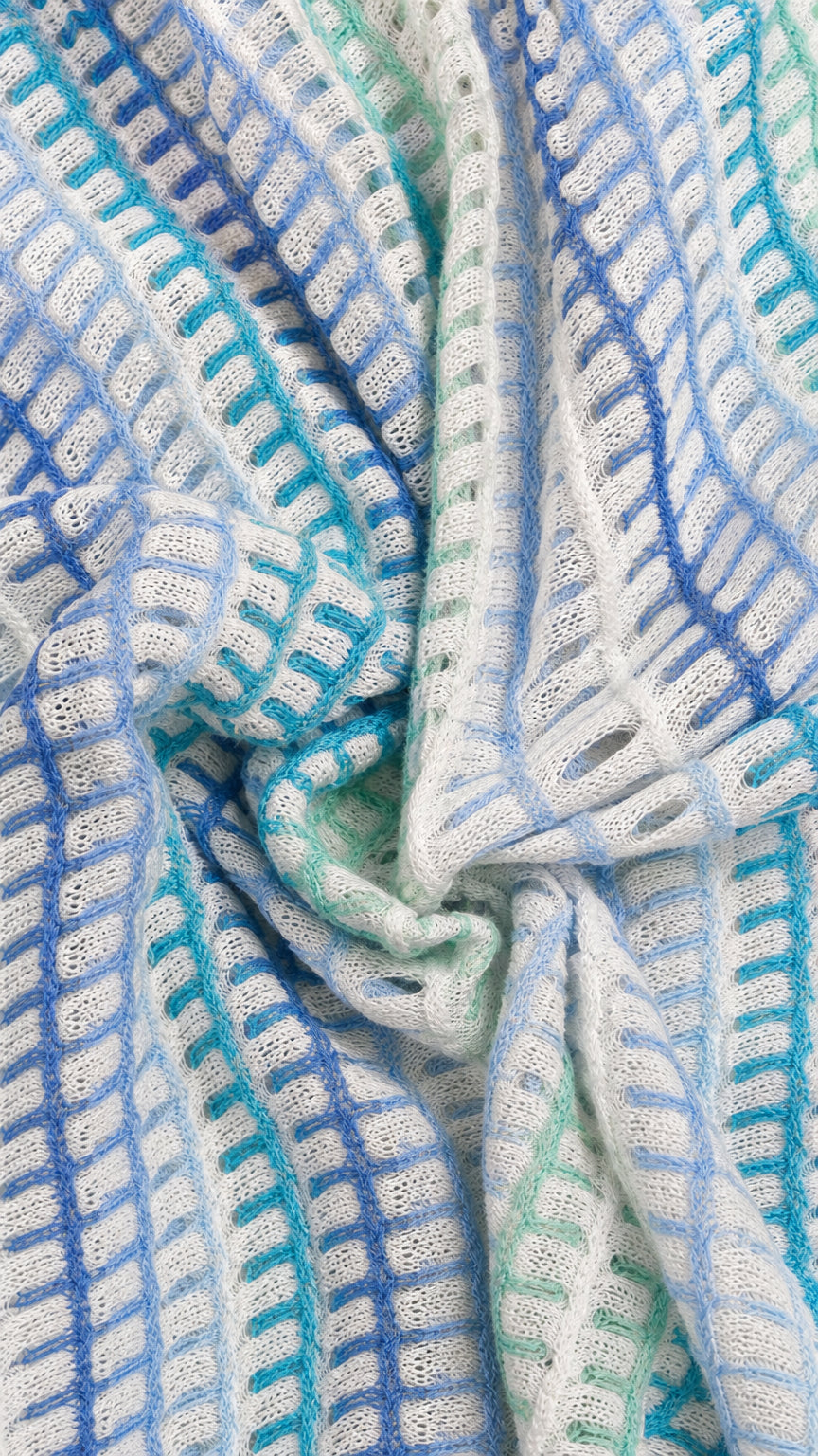 Close-up detail of blue textured knit fabric
