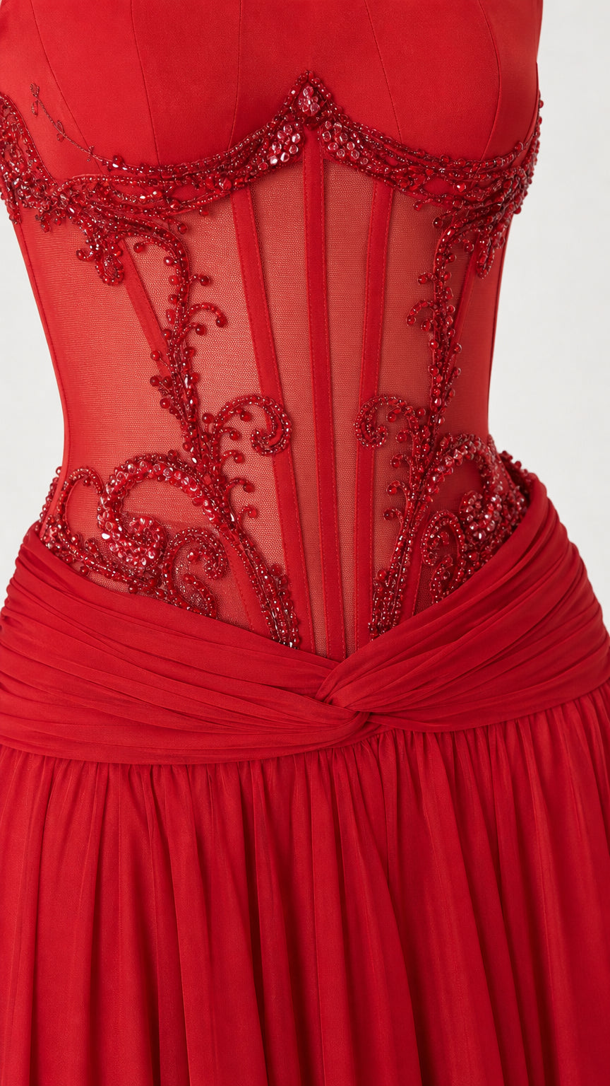 Close-up detail of red embroidered sheer corset bodice and draped waist
