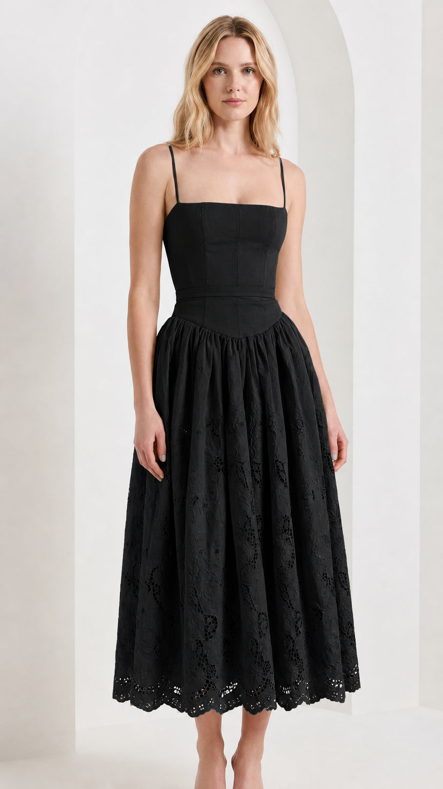 Front view of model wearing black sleeveless square neck embroidered midi dress
