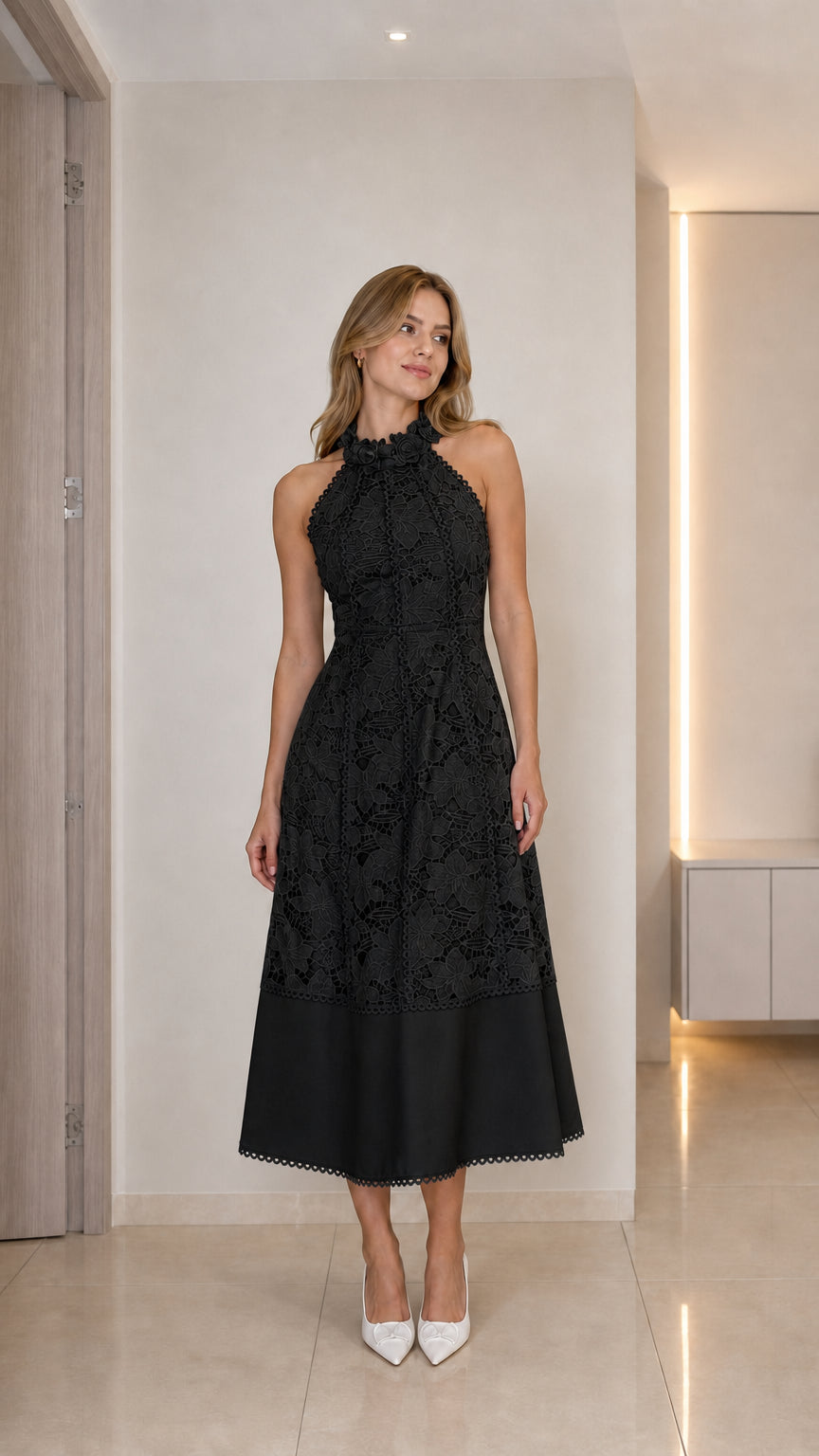 Model wearing black halter neck floral lace midi dress
