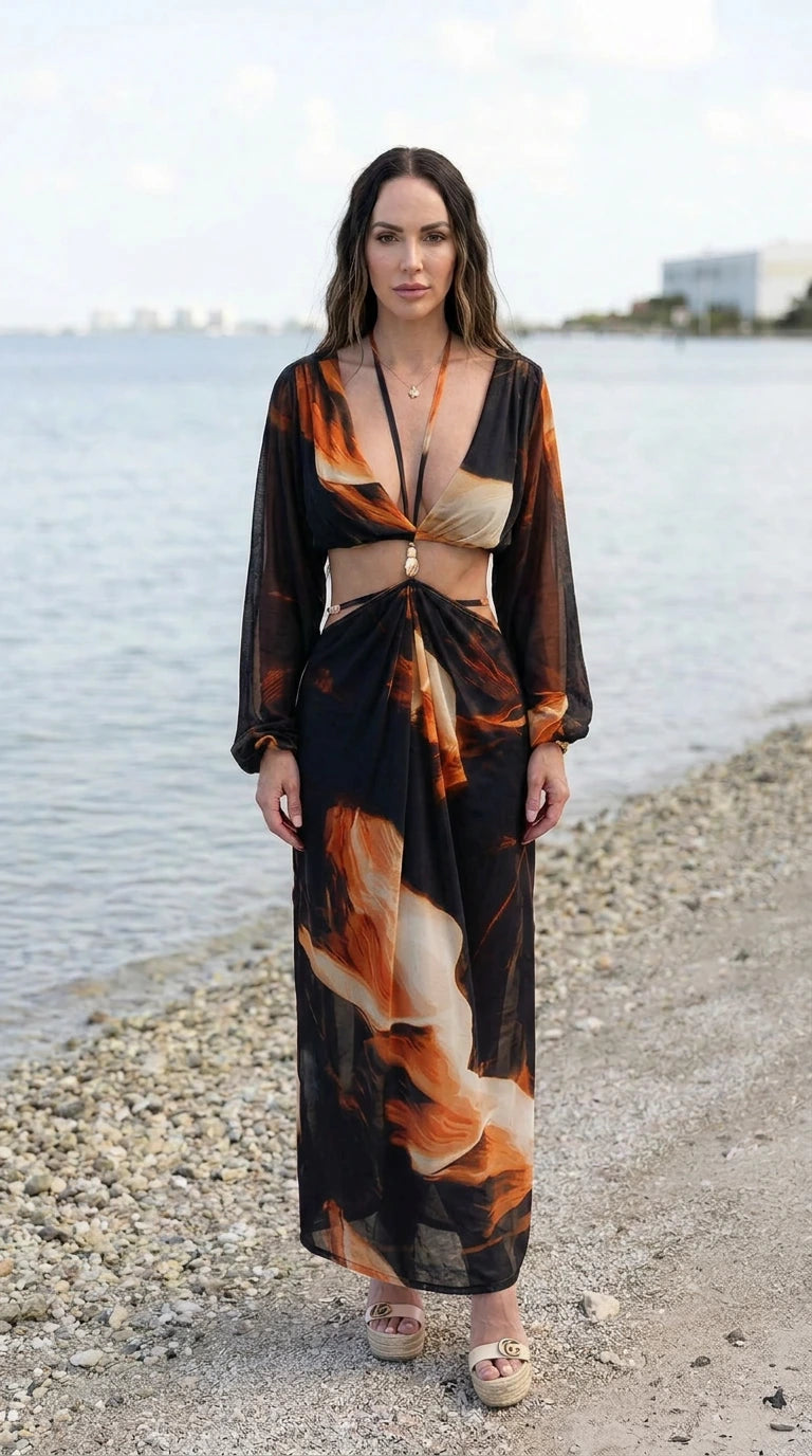 Front view of black abstract print cutout maxi dress