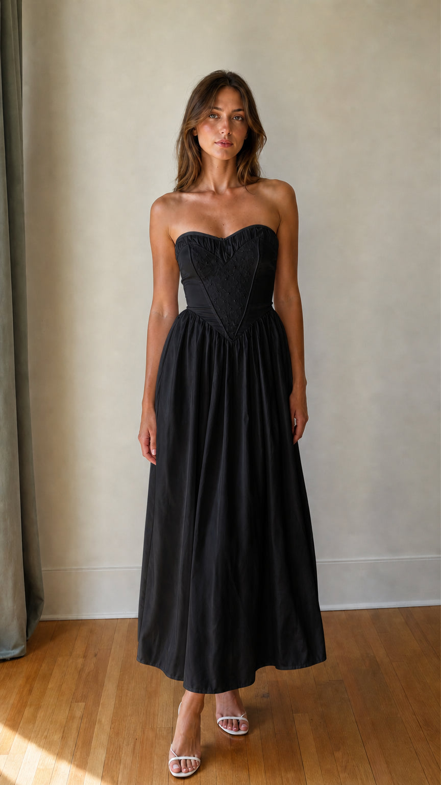Front view of Black strapless maxi dress
