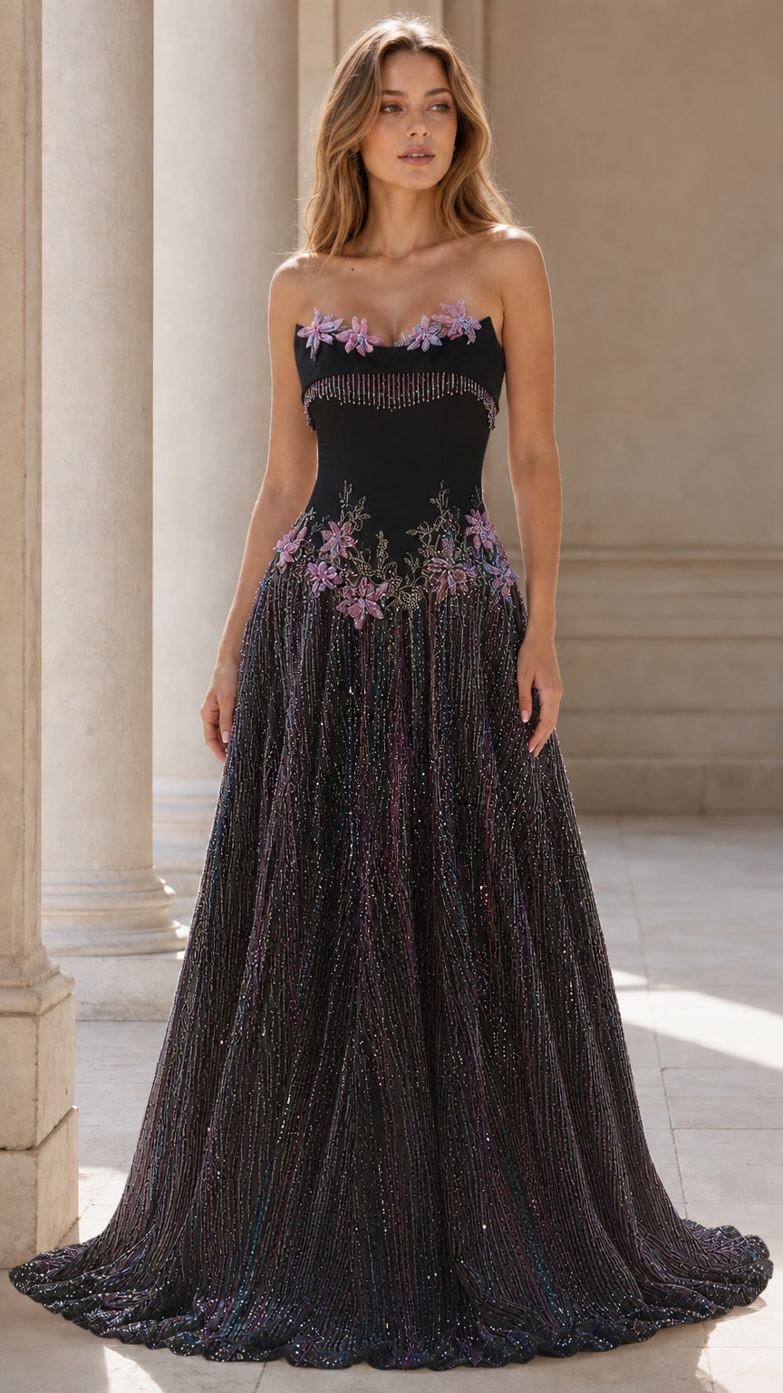 Front view of black strapless beaded evening gown