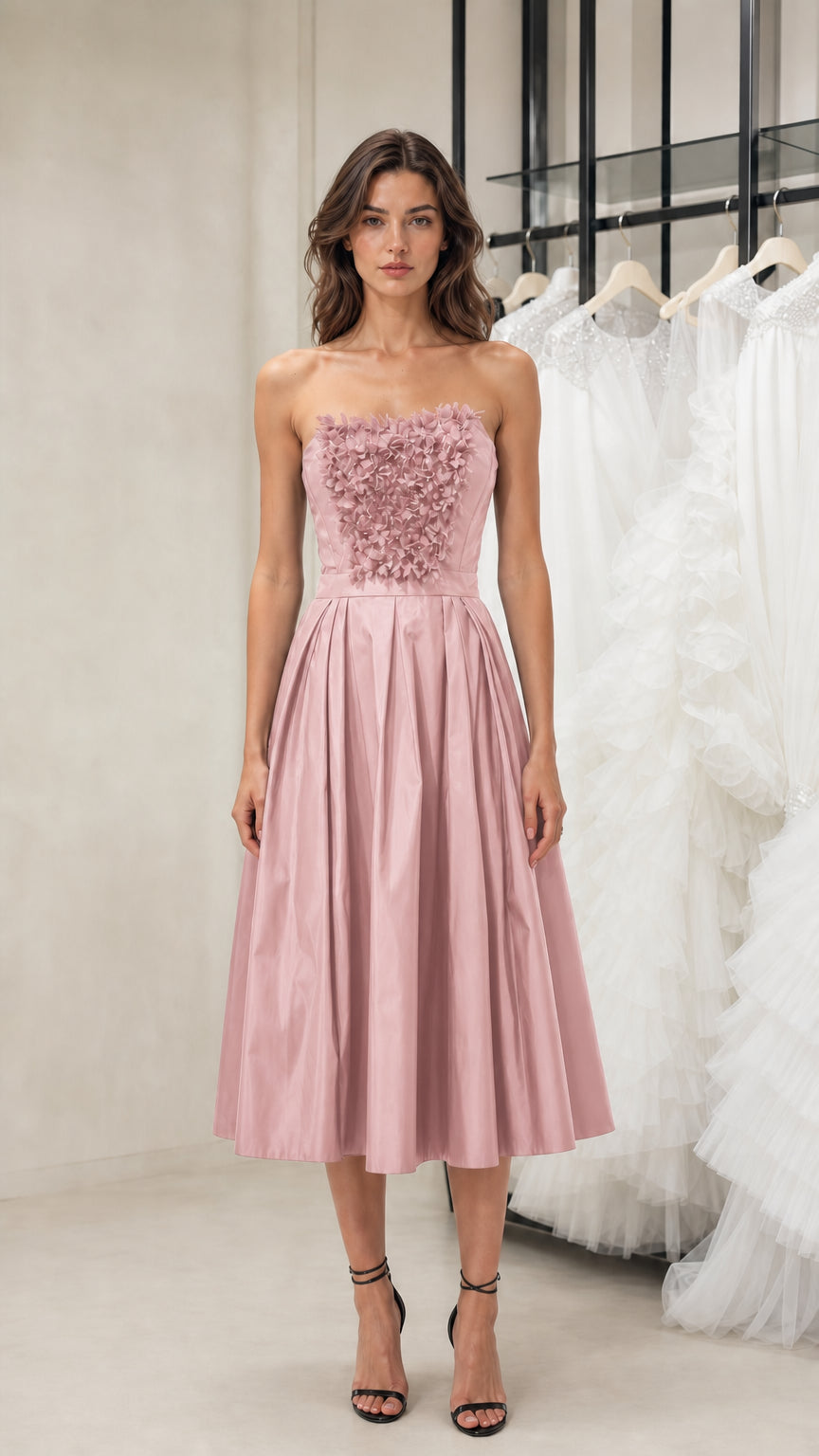 Front view of model wearing pink strapless midi dress