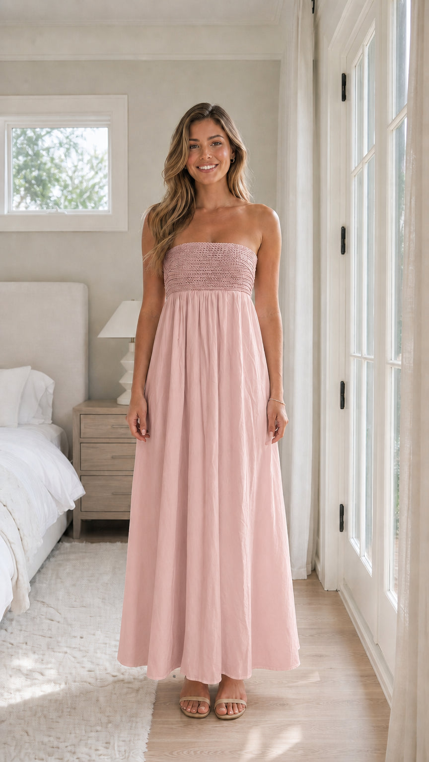 Full length view of woman wearing pink strapless maxi dress