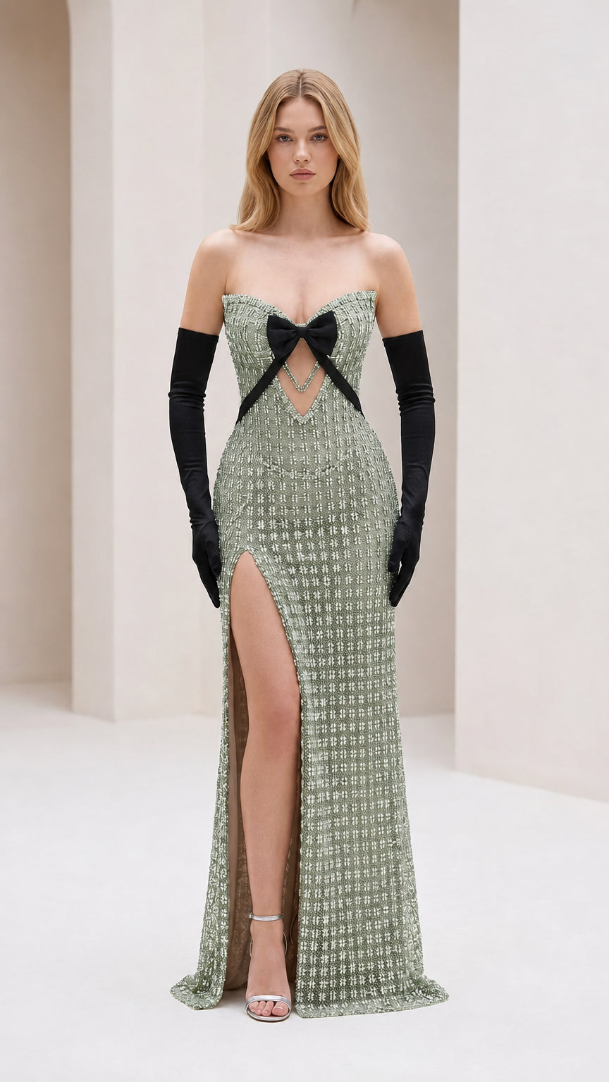 Front view of sage green crystal embellished strapless evening gown