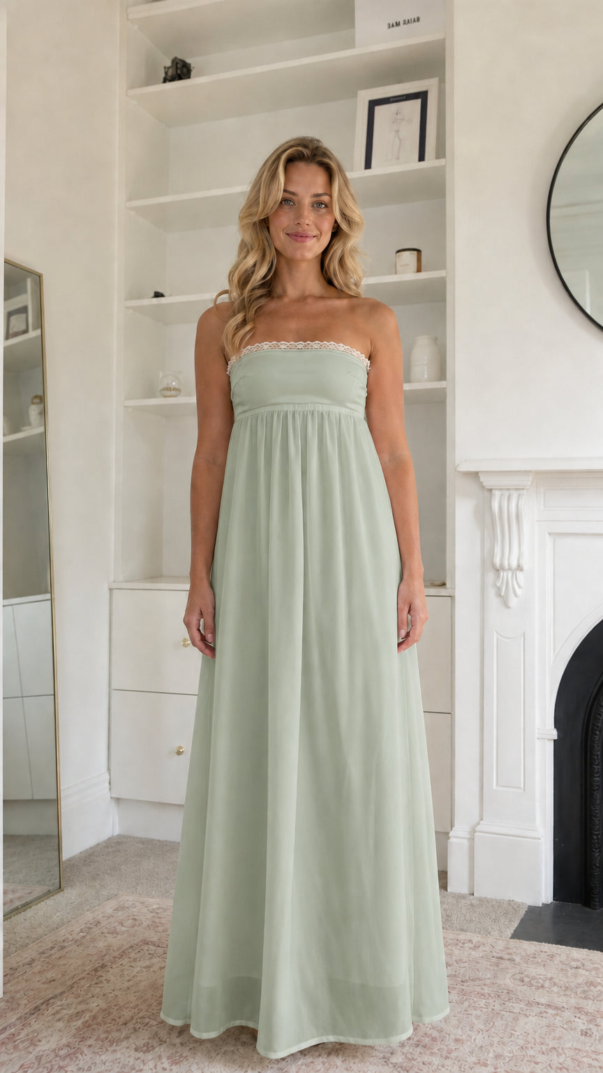 Woman wearing sage green strapless maxi dress