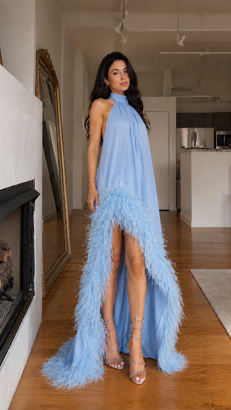 Front view of light blue halter high-low maxi dress with feather-trim hem