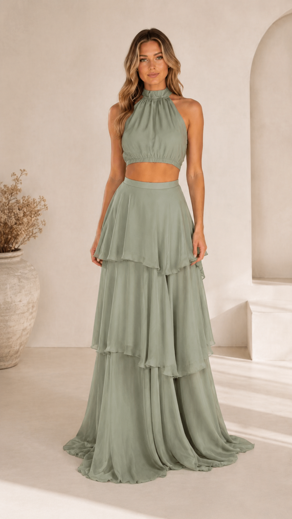 Front view of sage halter crop top and tiered maxi skirt set