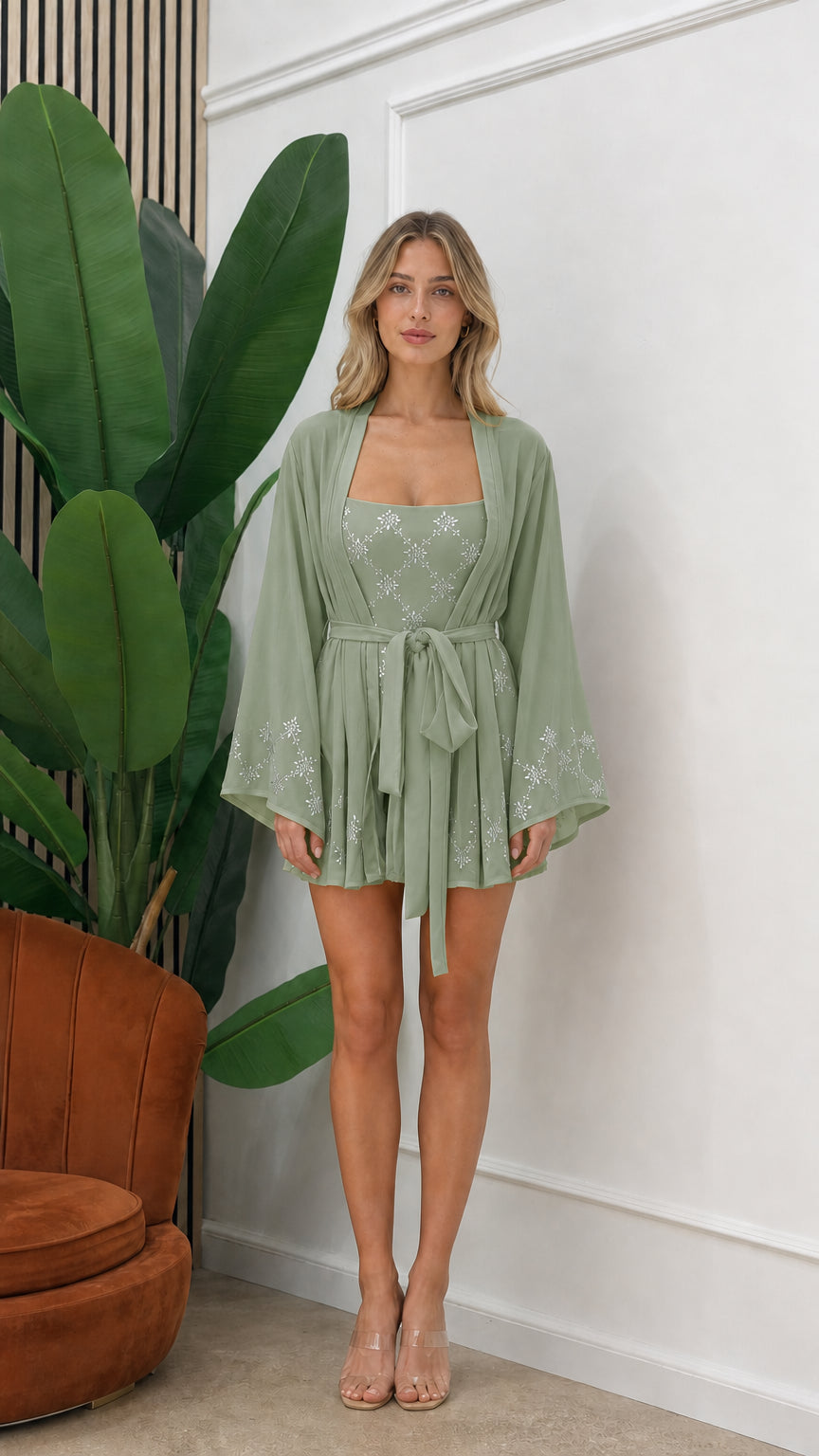 Front view of model wearing sage green embellished three-piece kimono set