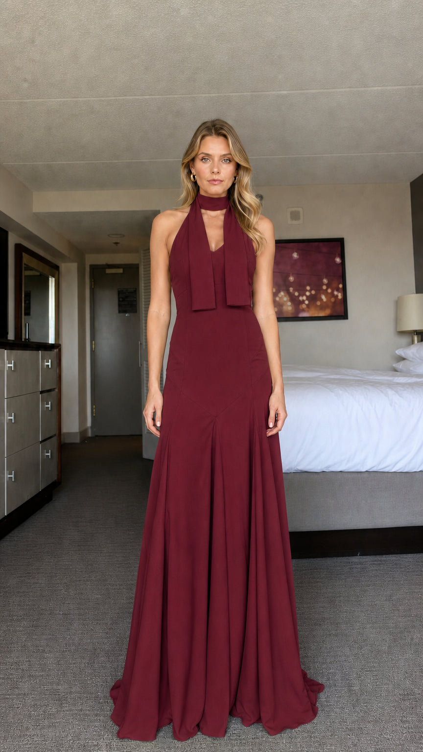 Model wearing burgundy halter neck formal maxi dress