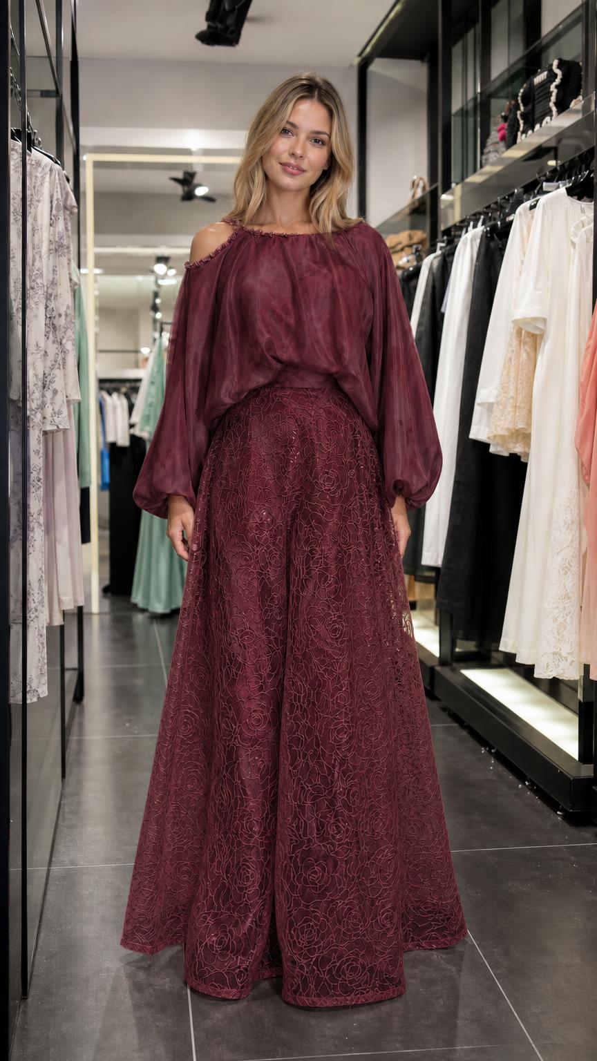 Model wearing burgundy two-piece set