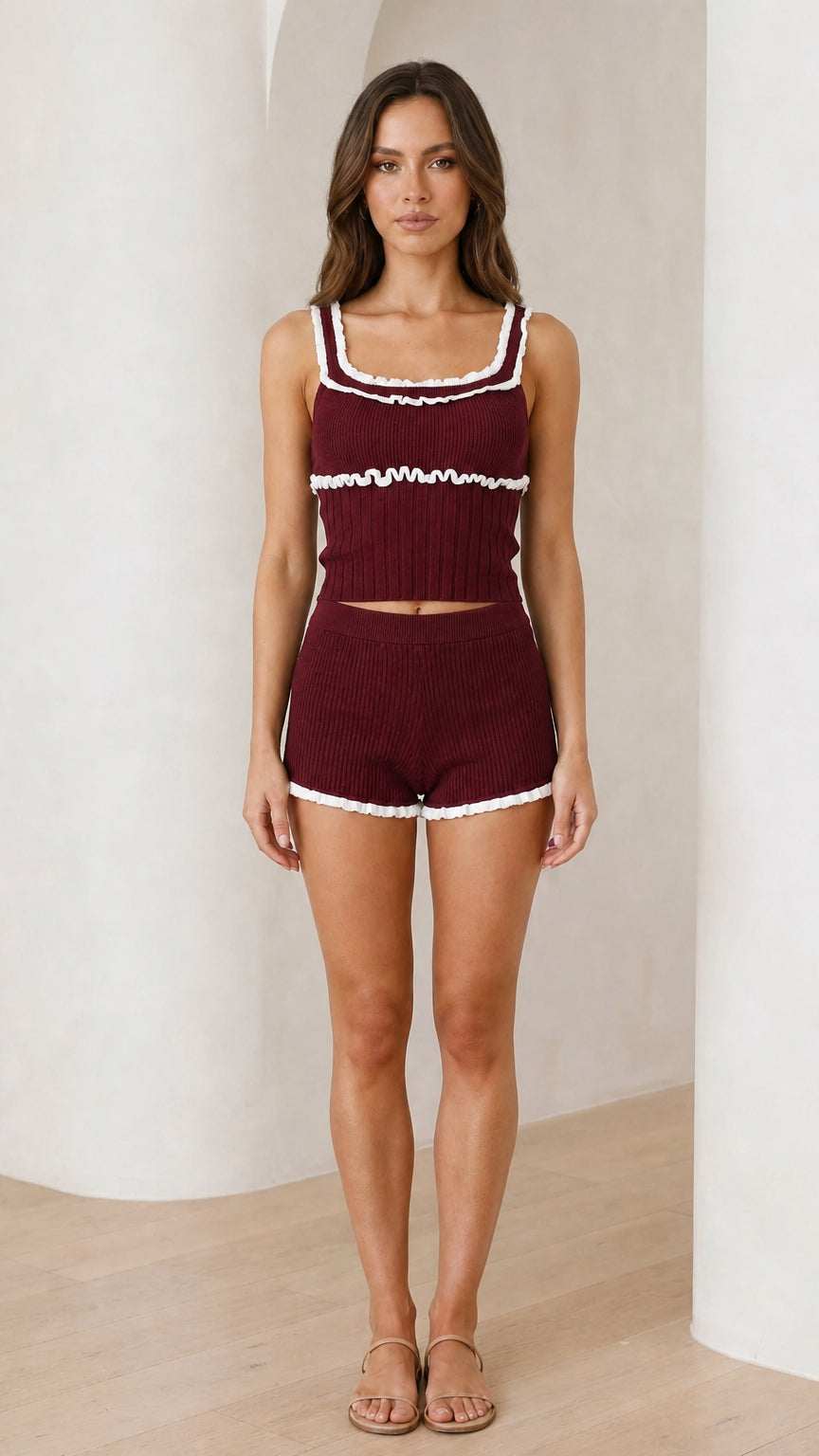 Front view of model wearing burgundy lounge set