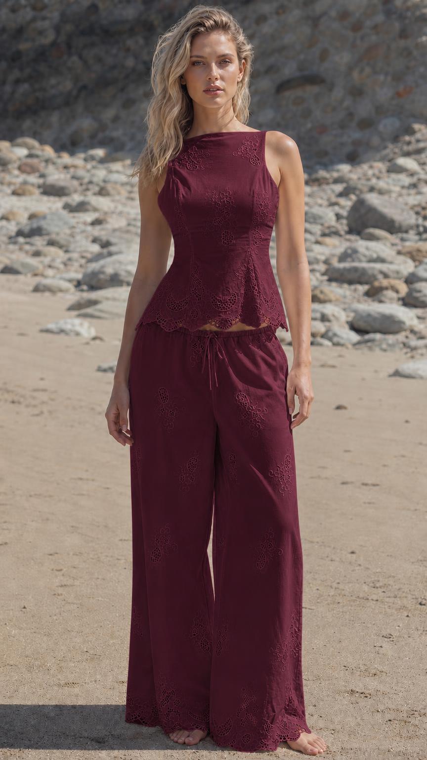 Woman wearing burgundy embroidered tank and wide-leg pants