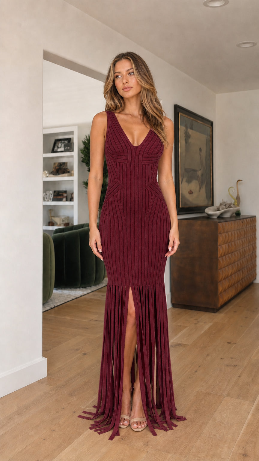 Front view of model wearing burgundy ribbed fringe maxi dress