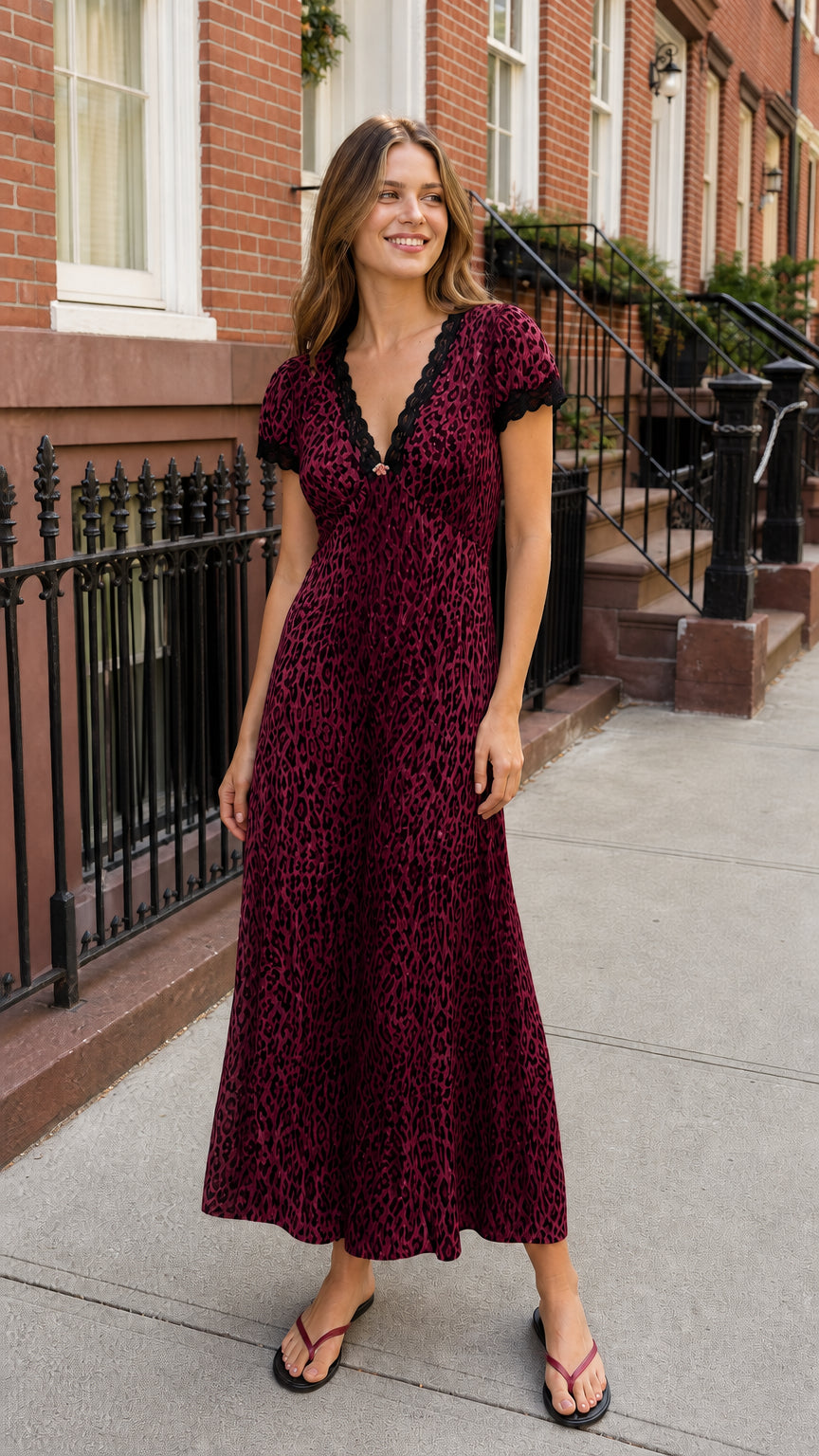 Woman wearing burgundy leopard print maxi dress