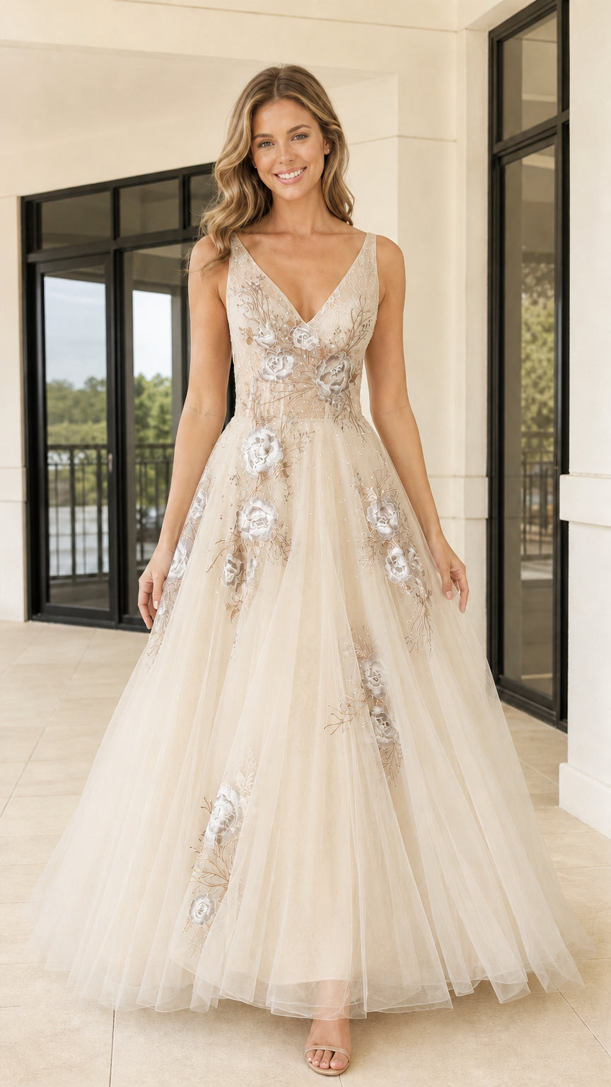 Front view of champagne floral embroidered tulle evening gown